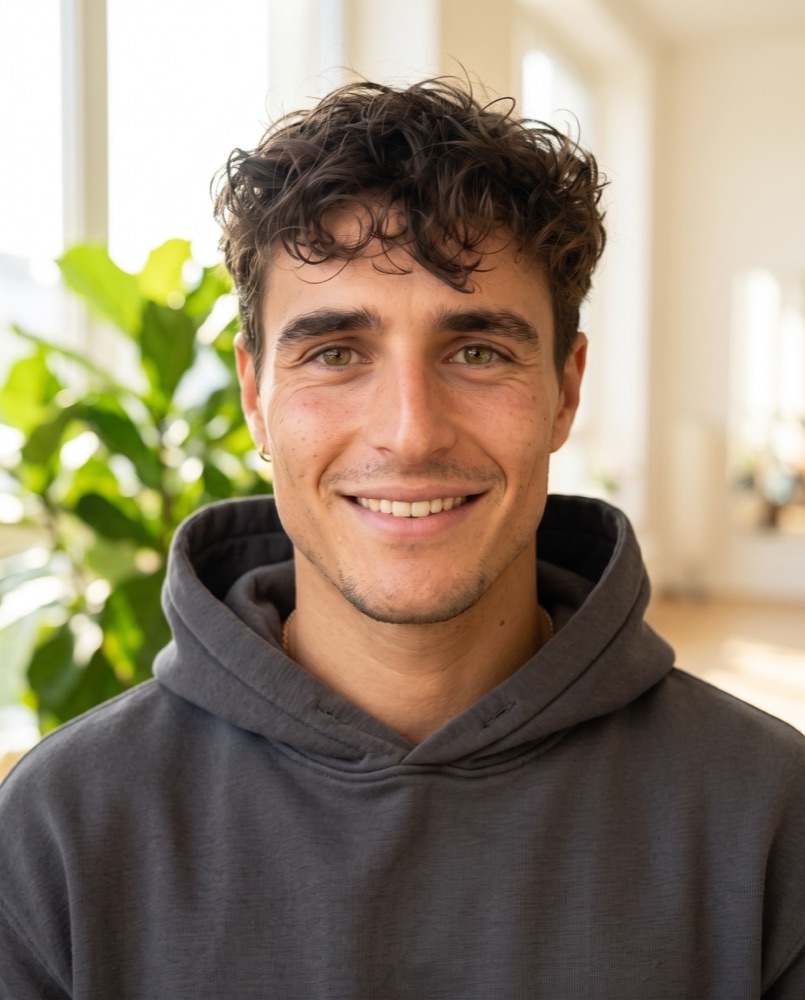 Marco, the face of MoveTogether, smiling warmly at the camera.